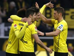 Dortmund ganó con dianas de Mats Hummels, Robert Lewandowski y Henrikh Mkhitarytan en el complemento. AP /