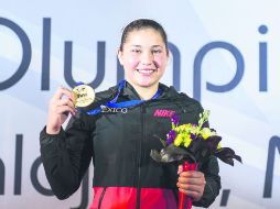 Inicio fuerte. La mexicana Dolores Hernández ganó el primer oro del día para México, en el trampolín de tres metros.  /