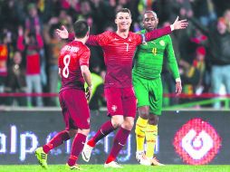 capitán. El astro del Real Madrid, Cristiano Ronaldo (7) celebra una de sus anotaciones ayer ante Camerún en la Fecha FIFA. AP /