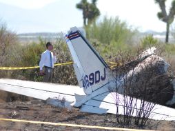 Rescatistas de la zona acudieron al lugar para brindar auxilio médico, aunque al llegar constataron que el piloto había muerto. ARCHIVO /