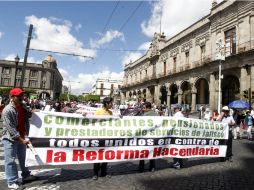 Comerciantes se manifiestan en el Centro de Guadalajara con la exigencia de derogar el Régimen de Incorporación Fiscal.  /