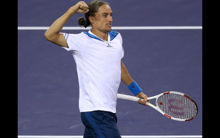 Alexandr Dolgopolov celebra su triunfo en la tercera ronda del Masters mil de tenis. AFP /