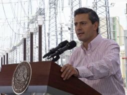 Enrique Peña Nieto participará en el acto en medio de las negociaciones de la ley secundaria de la Reforma Energética. ARCHIVO /