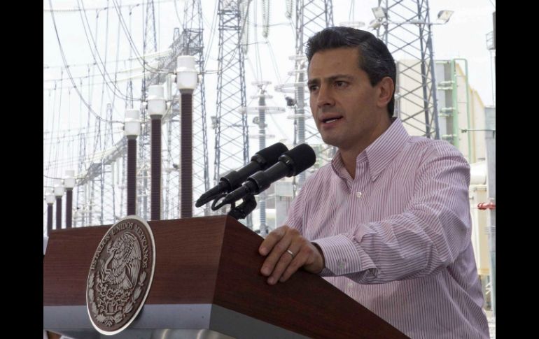 Enrique Peña Nieto participará en el acto en medio de las negociaciones de la ley secundaria de la Reforma Energética. ARCHIVO /