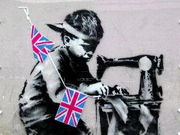 Obra de Banksy. Mural ubicado al norte de Londres; llamado 'Slave Labour'. ESPECIAL /