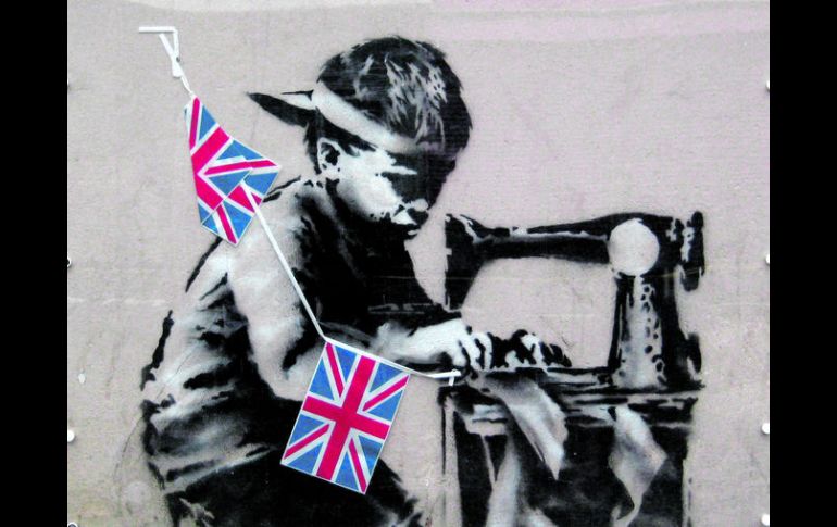 Obra de Banksy. Mural ubicado al norte de Londres; llamado 'Slave Labour'. ESPECIAL /