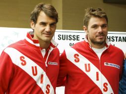 Los suizos Roger Federer y Stanislas Wawrinka (d) la pareja más llamativa sobre las canchas. AP /