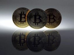 El Bitcoin es un tipo de dinero digital de carácter informal que apareció en 2009 como una alternativa a las monedas fiduciarias. ESPECIAL /