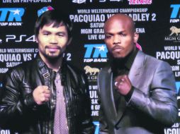 Espina clavada. Tim Bradley (der.) derrotó de manera polémica a Manny Pacquiaco el 9 de junio de 2012. NTX /