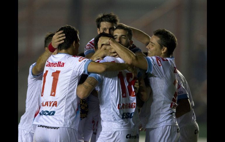 Los jugadores del Arsenal argentino festejan su triunfo. AFP /