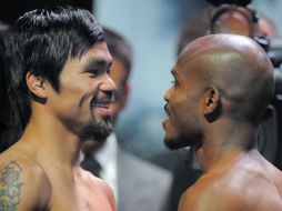 Bradley, lanzó una mirada desafiante en el frente a frente con 'Pacman', quien sólo se mostró tranquilo y sereno, incluso sonriente. AFP /