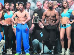 Pacquiao pesó 145 libras y Bradley 145.5, dejando todo listo para su combate por el cetro Welter de la OMB. AFP /