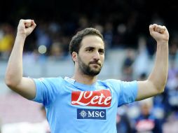 'Pipita' Higuaín anotó el primer gol de penal a los 49, aumentó a los 67 y puso la tercera cifra a los 90. AP /