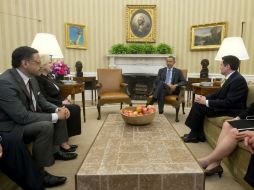 El presidente Obama con líderes religiosos en el encuentro por el cambio de la reforma migratoria. EFE /