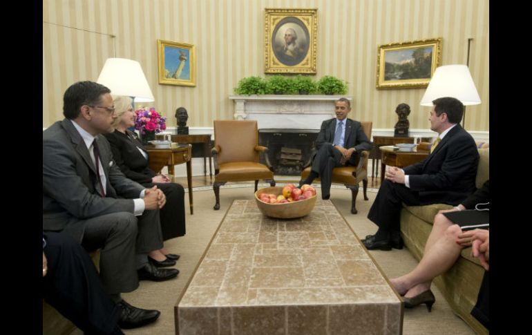 El presidente Obama con líderes religiosos en el encuentro por el cambio de la reforma migratoria. EFE /