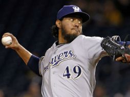 Yovani Gallardo permitió un jonrón productor de dos carreras en la primera entrada. AP /