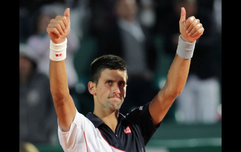 Novak Djokovic celebra su triunfo luego de pasar a semifinales del torneo de Montecarlo. AFP /