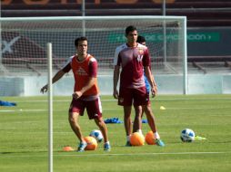 Los Tecos practicaron este jueves a puerta cerrada en la cancha del Estadio 3 de Marzo.  /