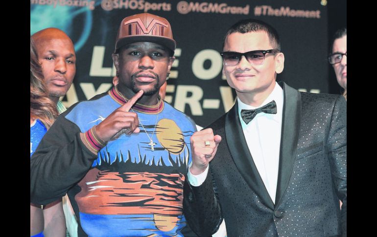 Mayweather Jr. expondrá su corona Welter del CMB, mientras que Maidana hará lo propio con el título del mismo peso, pero versión AMB. AFP /