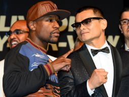 Bajarle las revoluciones a Floyd Mayweather será imperativo para Maidana. AFP /