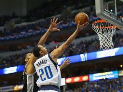 Los Mavericks lograron la victoria en casa y la serie se definirá  mañana en la cancha de los Spurs. AFP /