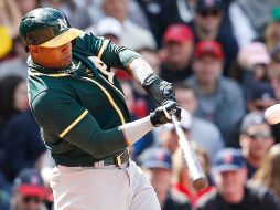 El guardabosques Yoenis Céspedes marcó la diferencia y otorgó la victoria a su equipo. AFP /