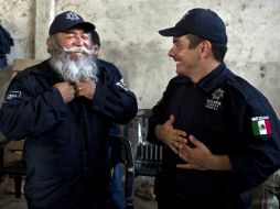 Ayer 10 de mayo, las autodefensas fueron presentadas como la Fuerza Rural de la Policía Estatal. ARCHIVO /