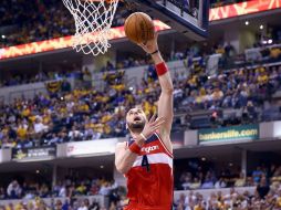 Marcin Gortat fue líder en la ofensiva de los Wizards. AFP /