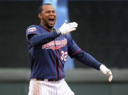 Aaron Hicks produjo la carrera de la victoria para los de Minnesota. AP /