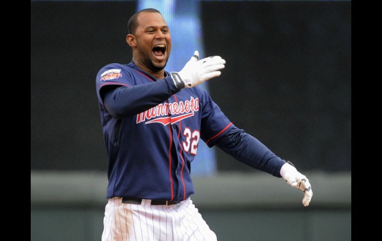 Aaron Hicks produjo la carrera de la victoria para los de Minnesota. AP /