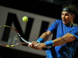 Nadal perdió el primer set y se vio un quiebere a bajo en el tercero, pero supo reponerse. Su próximo duelo será contra Dimitrov. AFP /