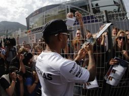 Los pilotos ya se encuentran en el Principado donde se efectuará la carrera. AFP /