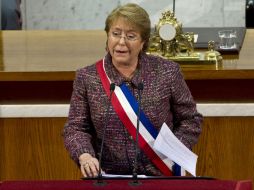 'Haremos los cambios de manera democrática y transparente', aseguró la presidenta de Chile, Michelle Bachelet. AFP /