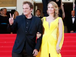 Quentin Tarantino asistió a la premier de la cinta ‘Sils Maria’ junto a la actriz Uma Thurman. AP /