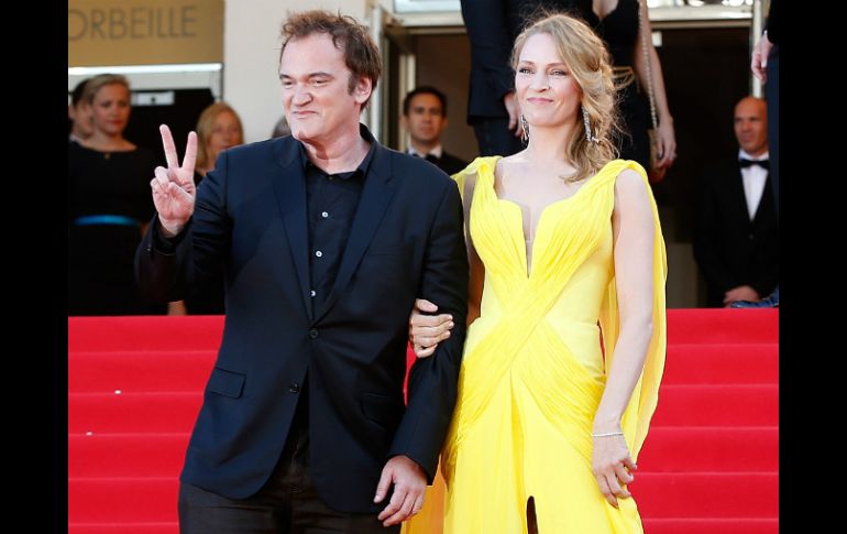 Quentin Tarantino asistió a la premier de la cinta ‘Sils Maria’ junto a la actriz Uma Thurman. AP /