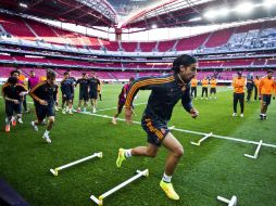 El cuadro ''merengue'', durante el entrenamiento de ayer en el estadio Da Luz, en Lisboa, previo a la final de la Champions. EFE /