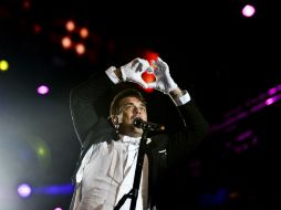 Robbie Williams, no defraudó a los alrededor de 60 mil seguidores que siguieron su concierto de apertura del Rock in Río. AFP /