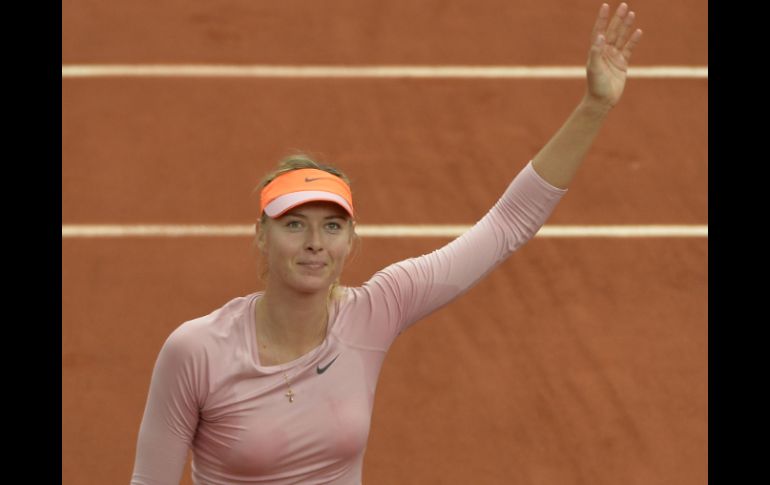 Sharapova vence 6-1, 6-2 a Ksenia Pervak. AFP /