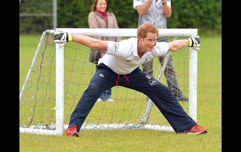 El principe Harry será el representante de la corona británica en la Copa del Mundo. AP /