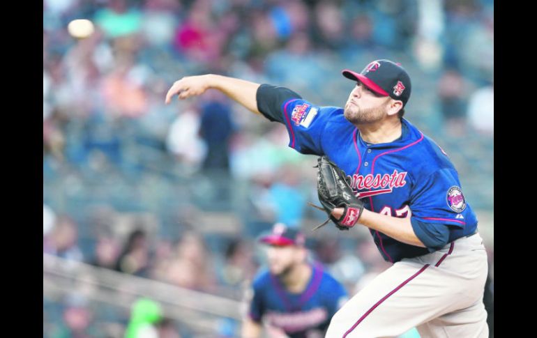 El lanzador de Minnesota, Ricky Nolasco, lanzó seis entradas para lograr su primera victoria en más de un mes. AFP /