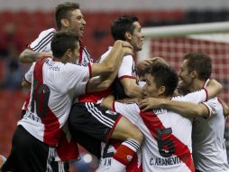 Los campeones de la liga argentina brillaron en un clásico deslucido. AP /