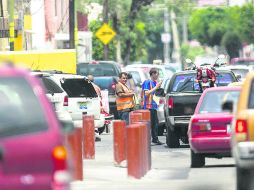 La empresa concesionaria de parquímetros asegura que existen 223 franeleros en la zona centro de Guadalajara.  /