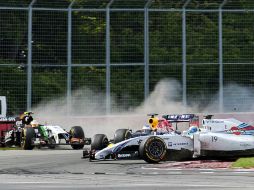 'Checo' Pérez y Felipe Massa chocaron en el Gran Premio de Canadá a una vuelta de terminar la carrera. AP /