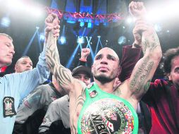 Hace historia. Cotto se convirtió en el primer boricua cuatro veces campeón del mundo. ESPECIAL /