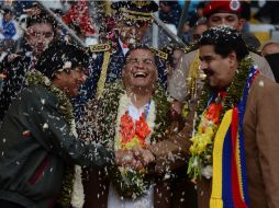 El presidente de Bolivia, Evo Morales y Nicolás Maduro, durante la ceremonia del G77. AP /