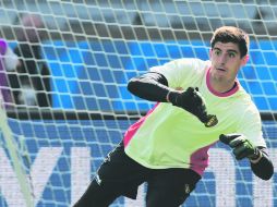 Courtois llega convertido en una de las figuras de la escuadra belga, que busca dejar huella en esta Copa del Mundo. EFE /