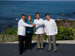 Ollanta Humala, Michele Bachelet, Enrique Peña Nieto y Juan Manuel Santos, durante la IX Cumbre de la Alianza del Pacífico. ESPECIAL /