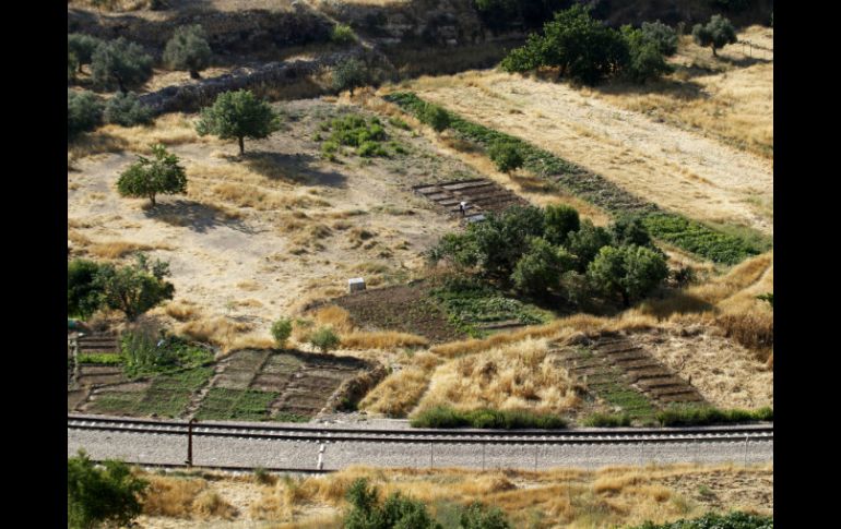 La UNESCO mencionó como amenaza 'el inicio de la construcción de un muro de separación que podría aislar a los campesinos'. AFP /