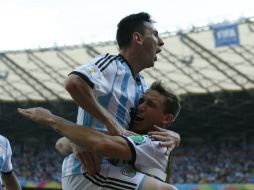 En un mal partido de la albiceleste y cuando parecía que todo iba a acabar  en tablas, Messi sorprende y da el triunfo a Argentina. AP /