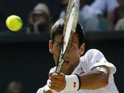 El tenista Novak Djokovic, busca reconquistar el título ganado en el All England Club en 2011. AP /